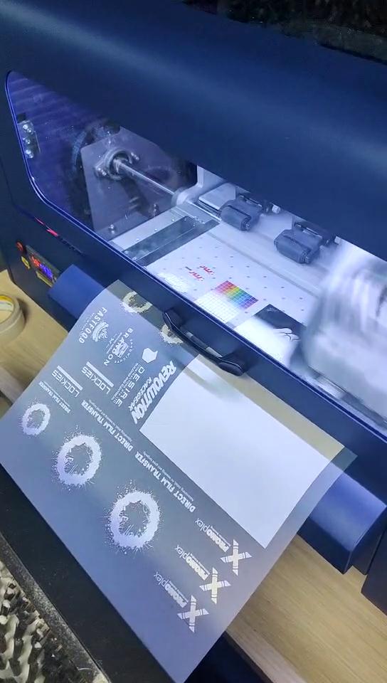 DTF Film to garment printer 2022 with fluorescent inks for application to fabrics of all kinds